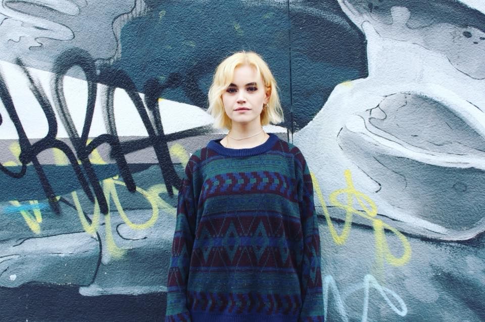 Image may contain: Universe, Space, Outer Space, Astronomy, Woman, Girl, Female, Blonde, Graffiti, Person, People, Human