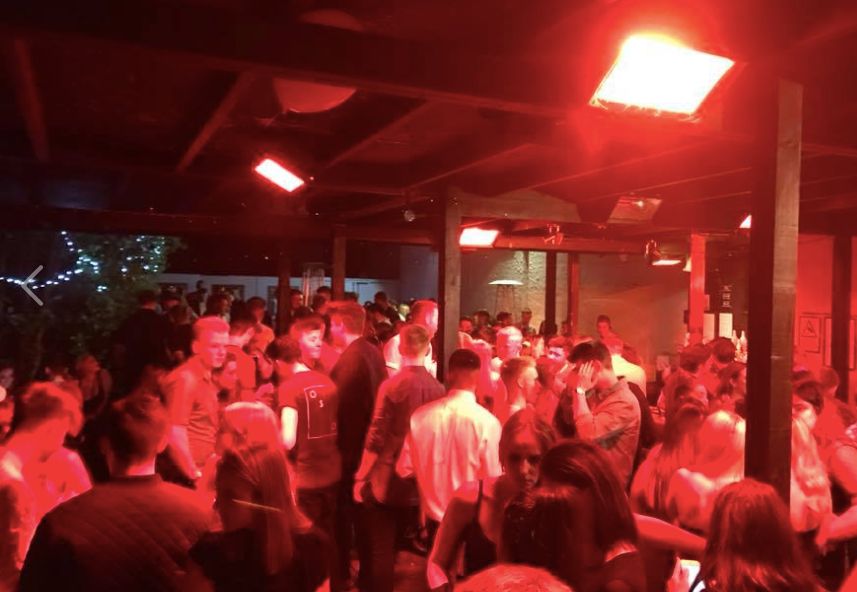 Image may contain: Night Life, Night Club, Club, Crowd, Audience, Person, People, Human