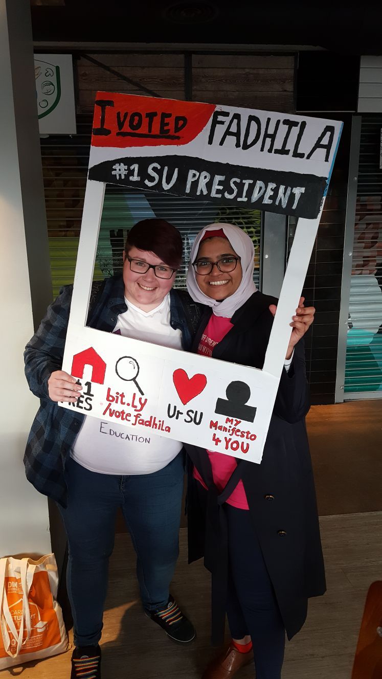 Image may contain: Text, Banner, Parade, Crowd, Person, People, Human
