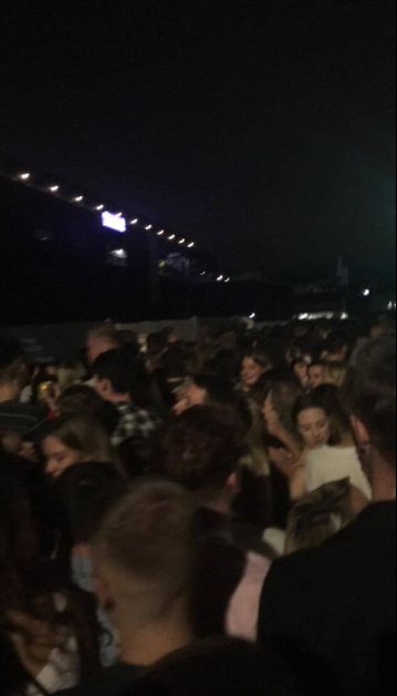 Image may contain: Audience, Night Life, Crowd, Person, People, Human