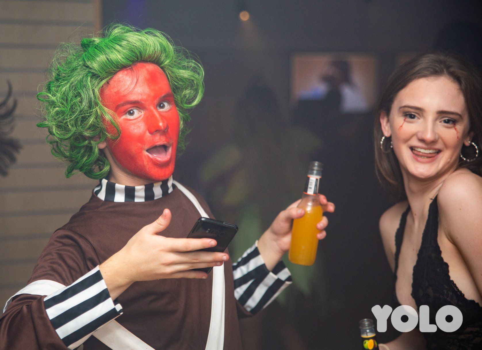 Image may contain: Clown, Beverage, Drink, Alcohol, Beer, Person, Human, Performer