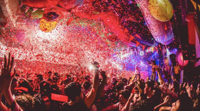 Image may contain: Disco, Paper, Night Life, Night Club, Human, Person, Club