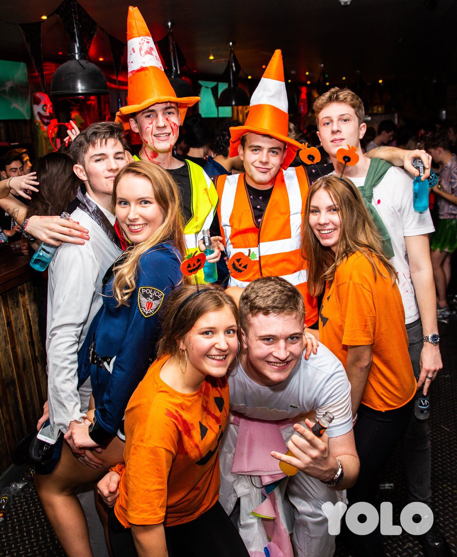 Image may contain: Party Hat, Hat, People, Helmet, Person, Human, Clothing, Apparel