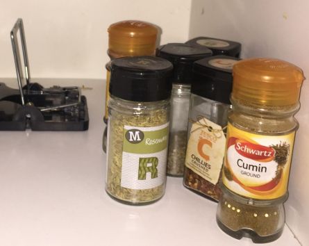 Image may contain: Cabinet, Shelf, Spice, Furniture, Jar, Label, Text