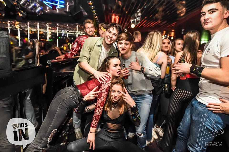 Image may contain: Leisure Activities, Pants, Clothing, Apparel, Night Club, Club, Party, Night Life, Person, Human