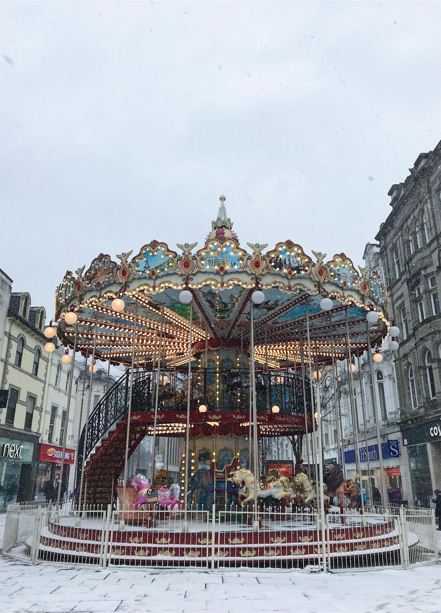 Image may contain: Human, Person, Carousel, Theme Park, Amusement Park