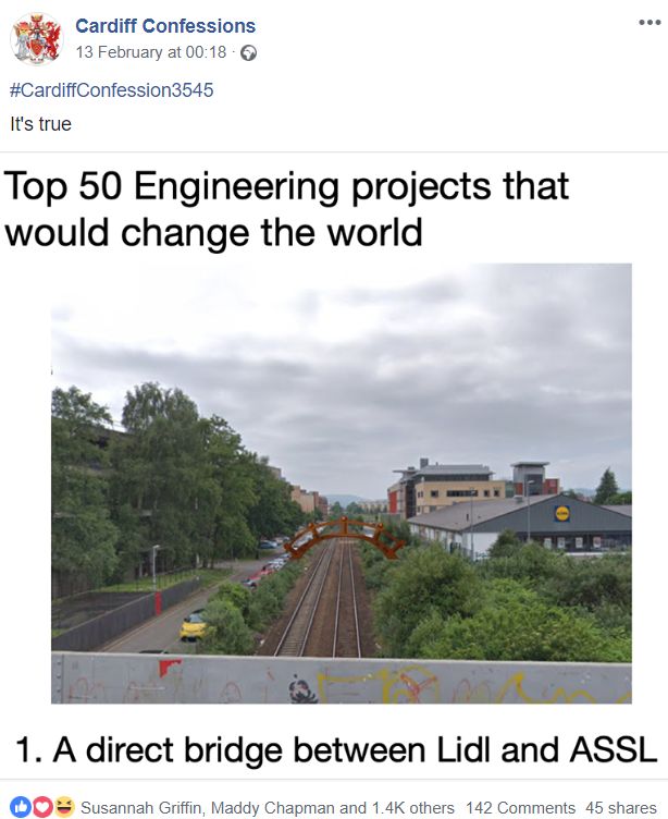 Image may contain: Advertisement, Road, Text, Train Track, Rail, Railway, Transportation
