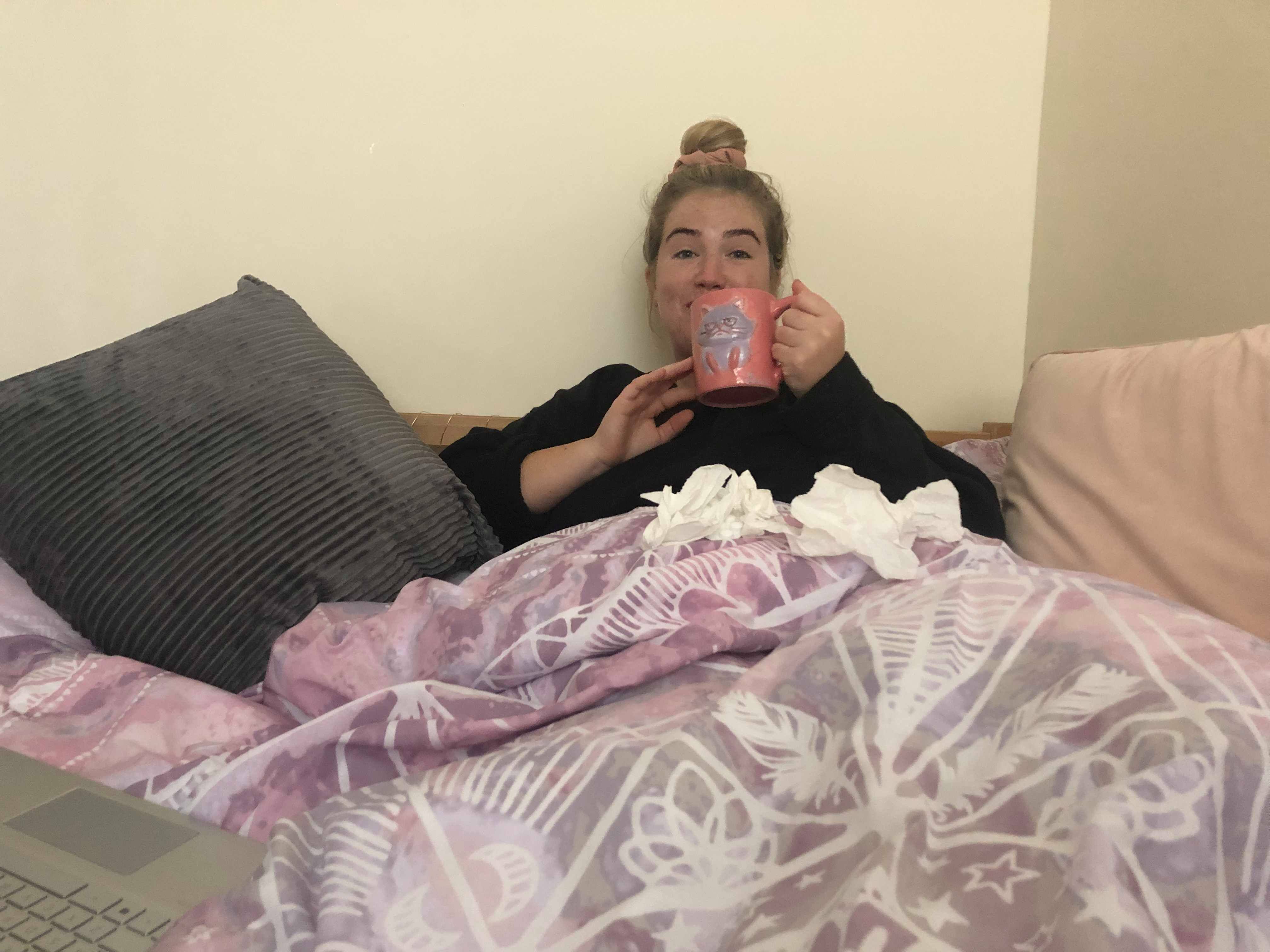 Image may contain: Shelf, Finger, Human, Person, Bed, Furniture, Couch