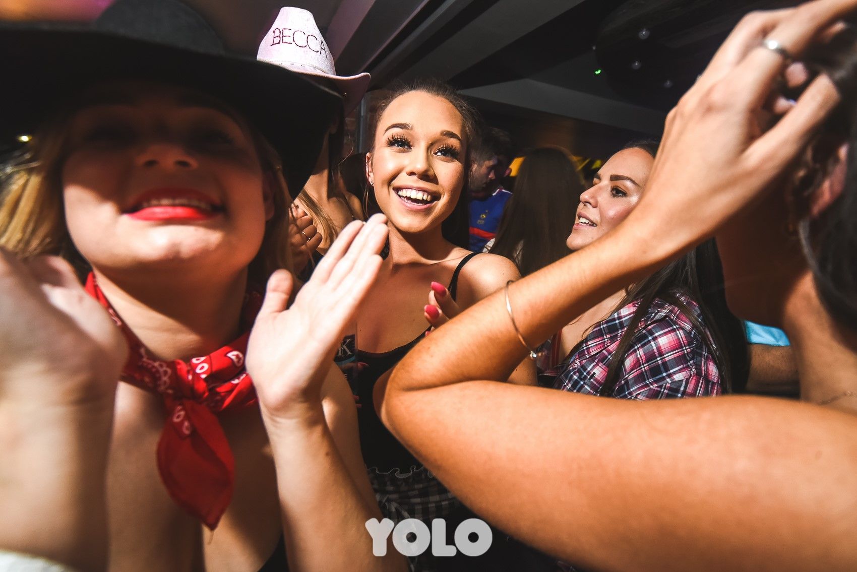 Image may contain: Cowboy Hat, Party, Night Club, Club, Person, Human, Clothing, Apparel, Hat
