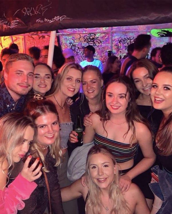 Image may contain: Female, Portrait, Photo, Photography, People, Head, Smile, Night Club, Face, Night Life, Club, Person, Human, Party