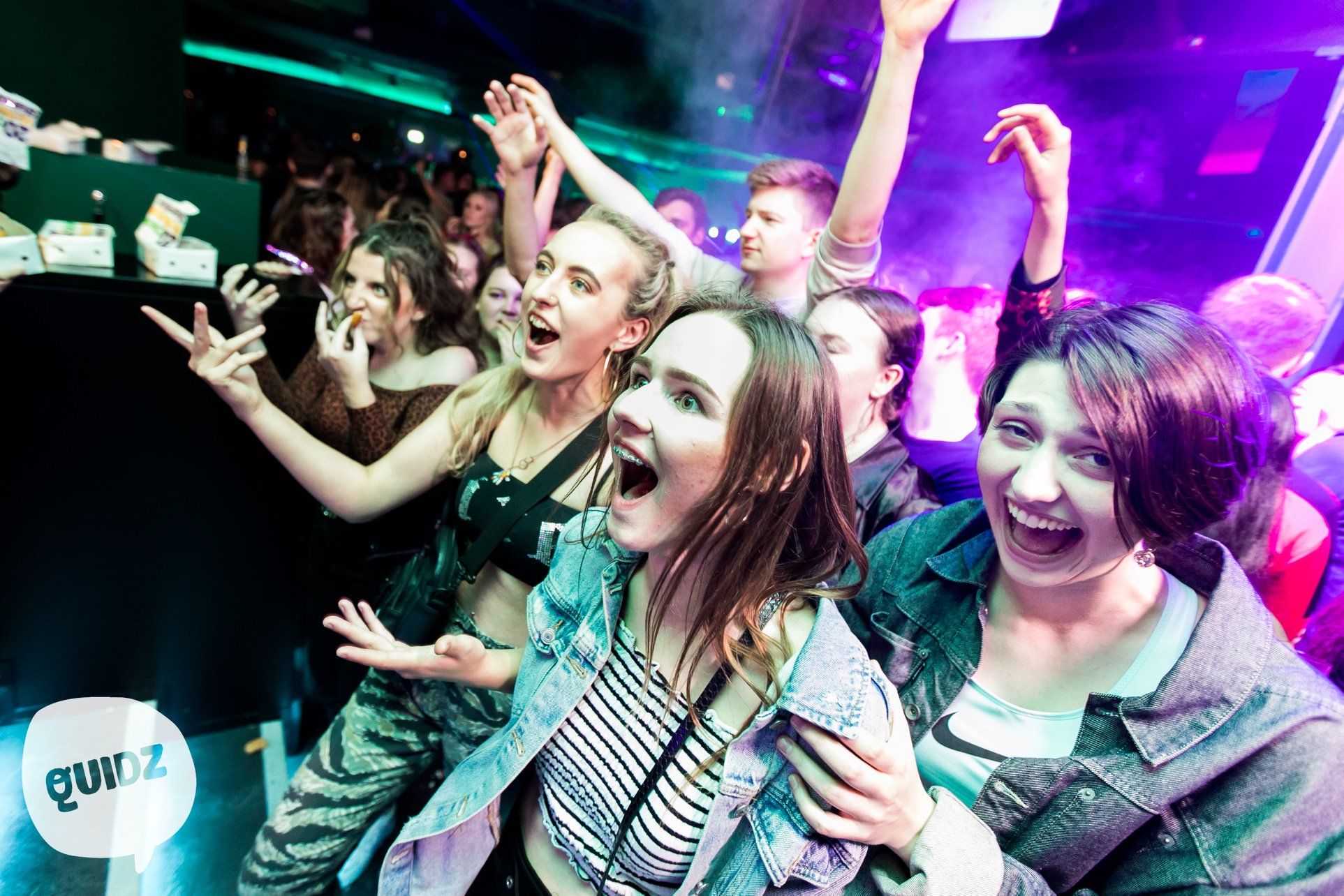 Image may contain: Lighting, Crowd, Leisure Activities, Night Club, Night Life, Face, Club, Party, Human, Person