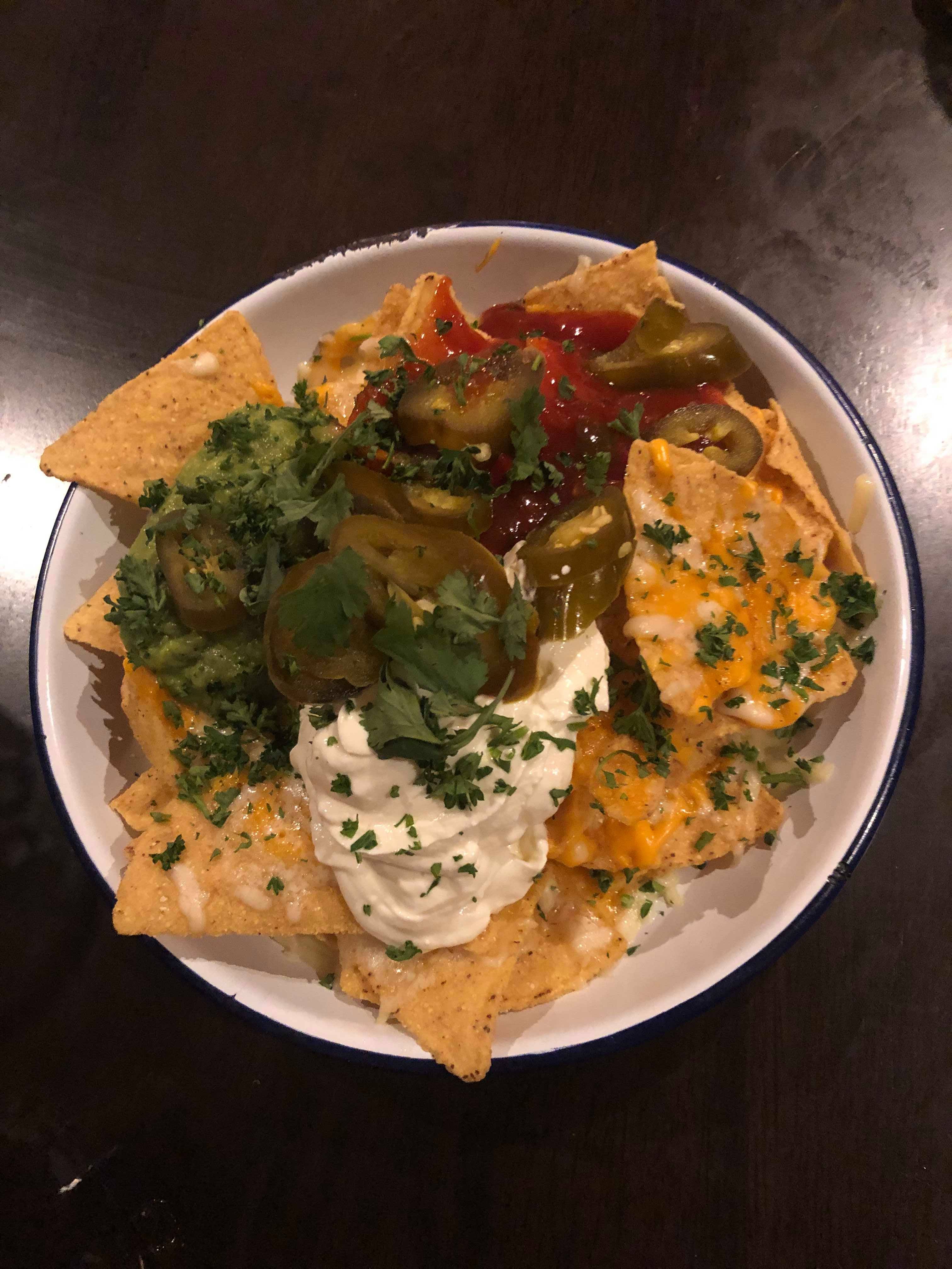 Image may contain: Nachos, Meal, Dish, Food
