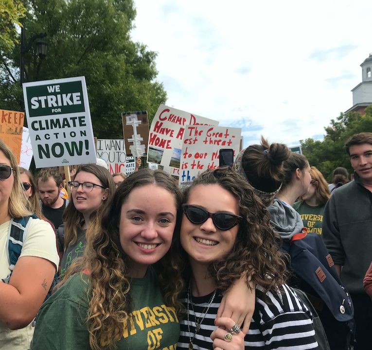 Image may contain: People, Word, Glasses, Text, Protest, Parade, Crowd, Accessories, Accessory, Sunglasses, Person, Human