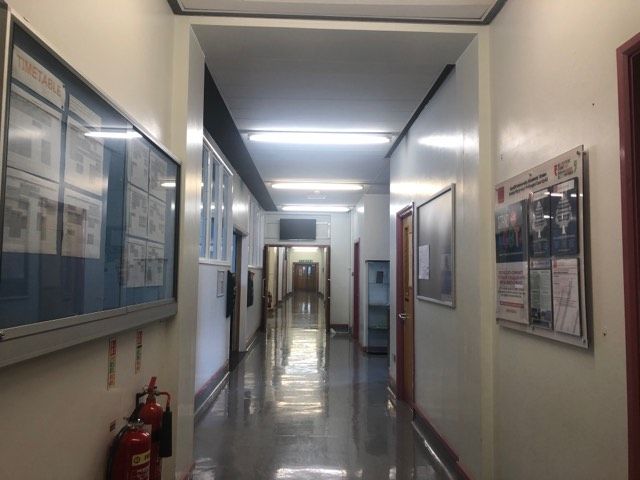 Image may contain: Flooring, Floor, Corridor