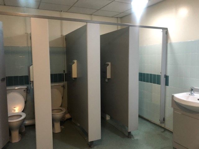 Image may contain: Sink, Door, Bathroom, Toilet, Indoors, Room