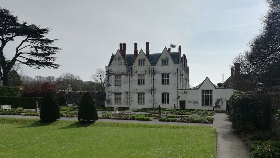 Image may contain: Castle, Tree, Villa, Architecture, Lawn, House, Housing, Building, Mansion, Plant, Grass
