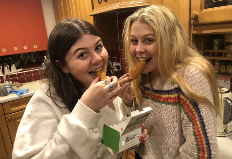 Image may contain: Girl, People, Furniture, Face, Female, Dish, Eating, Meal, Lunch, Food, Person, Human