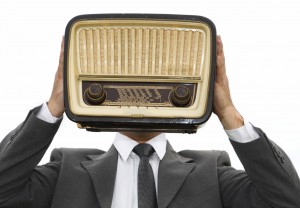 The suit man, that has the radio by head