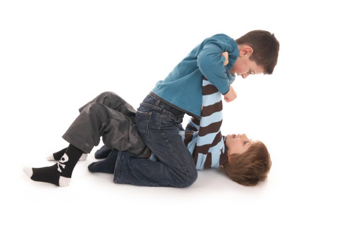 two boys fighting