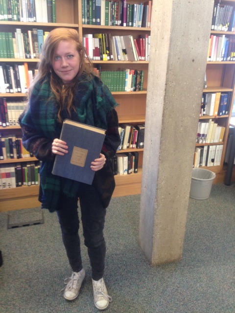 Lulu, MML at Magdalene. White shoes, big book.