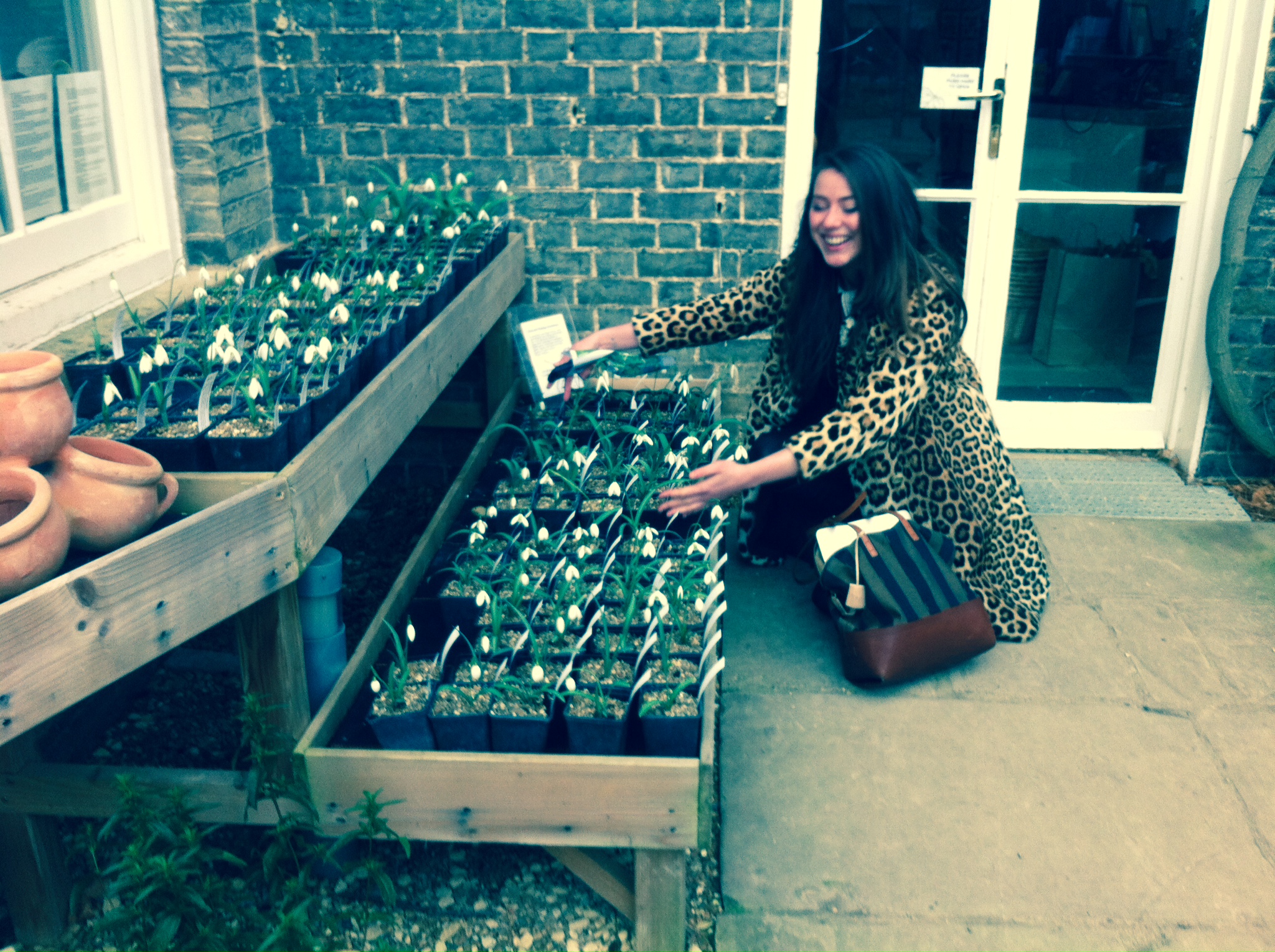 No-one has ever looked this happy around potted plants
