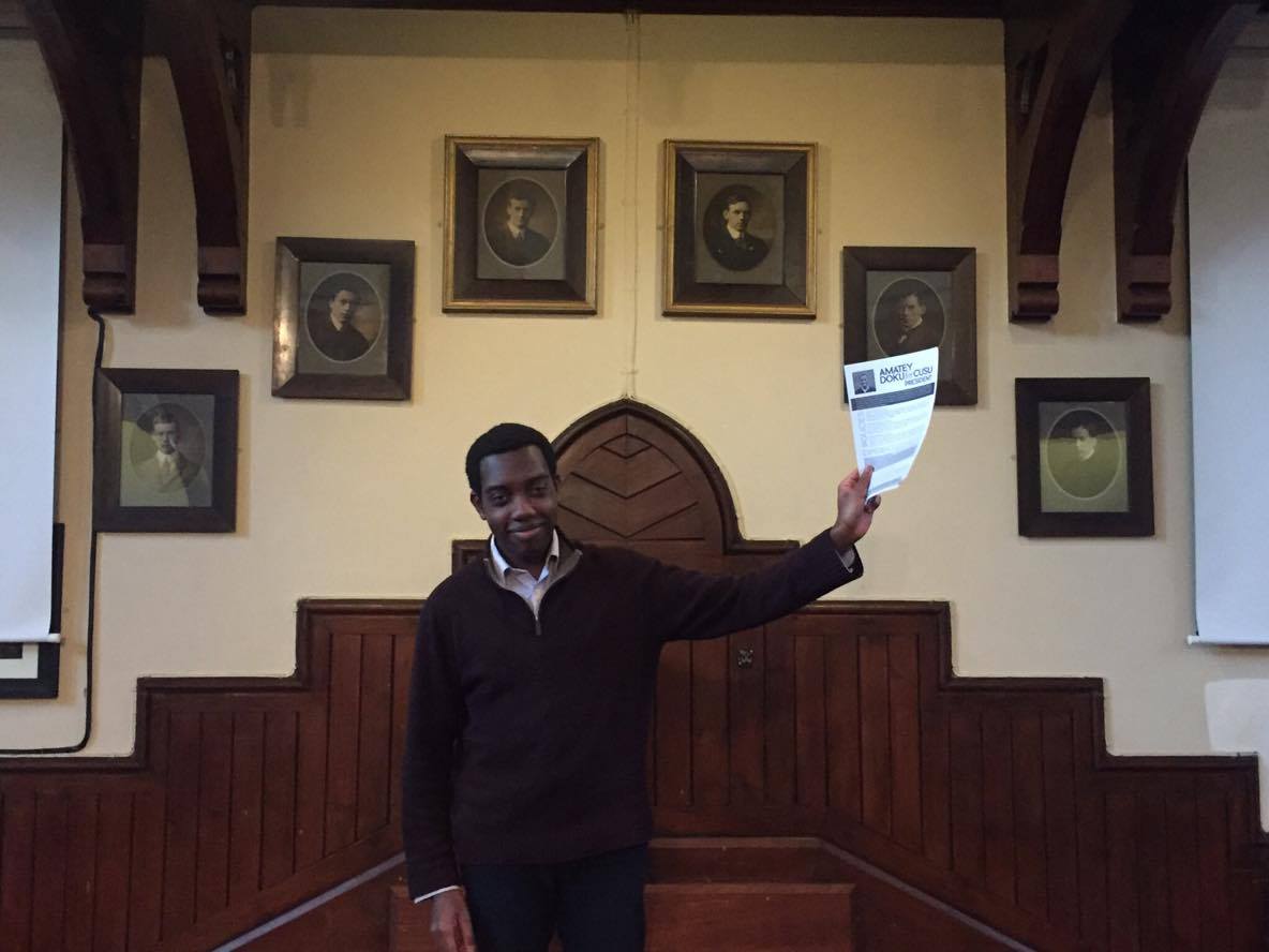With his manifesto.