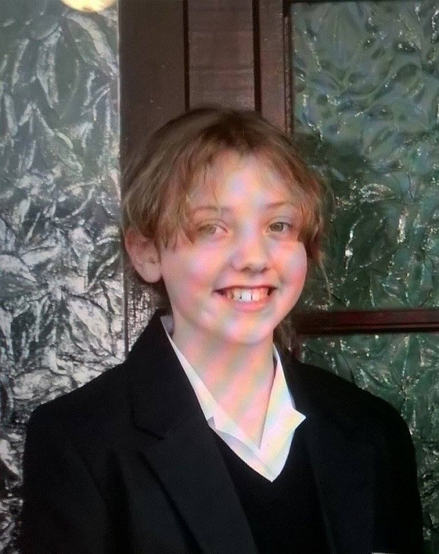 Me on my first day of secondary school. If you find a way to unsee this, please let me know how.