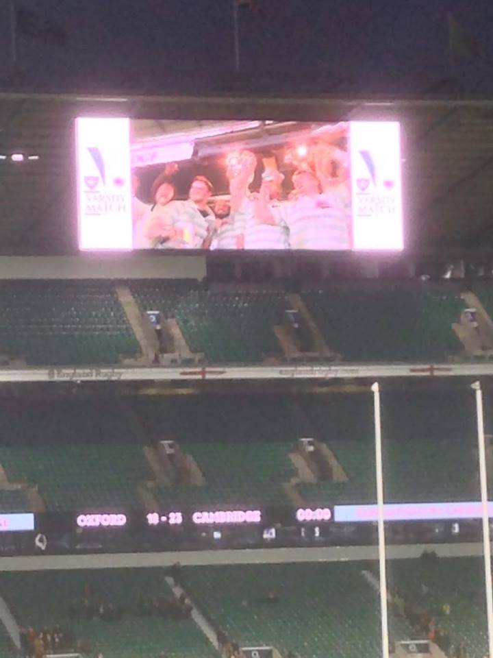 Lifting their trophy high