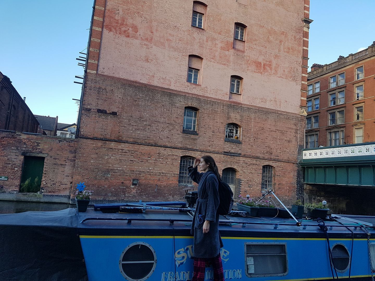 Image may contain: Gondola, Fort, Castle, Human, Person, People, Watercraft, Boat