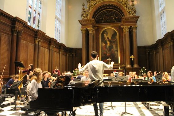 Image may contain: Grand Piano, Altar, Architecture, Building, Church, Pianist, Piano, Performer, Musician, Musical Instrument, Leisure Activities, Indoors, Interior Design, Human, Person