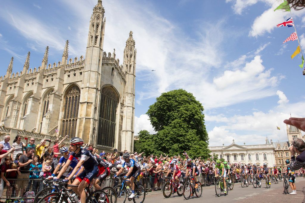 Image may contain: Machine, Wheel, Downtown, Town, City, Urban, Tower, Spire, Steeple, Cyclist, Sports, Sport, Building, Architecture, Bicycle, Bike, Transportation, Vehicle, Person, Human