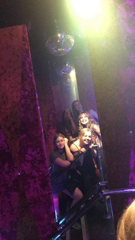 Image may contain: Selfie, Girl, Smile, Portrait, Photography, Photo, Clothing, Apparel, Party, Costume, Light, Female, Purple, Night Club, Lighting, Club, Face, Human, Person, Night Life