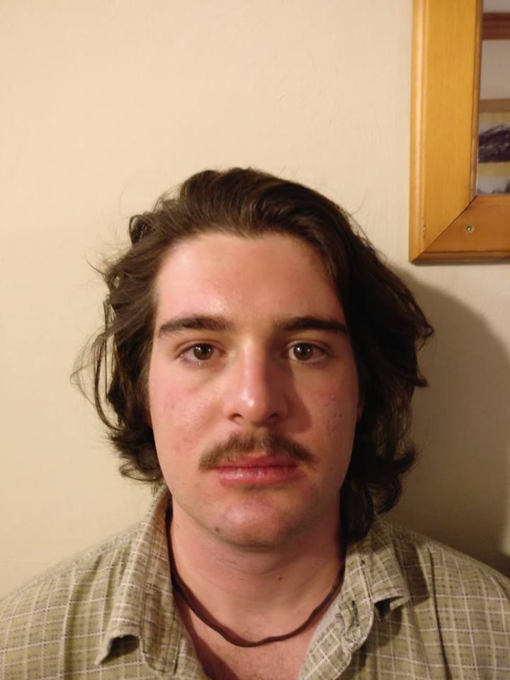 Image may contain: Mustache, Face, Person, Human