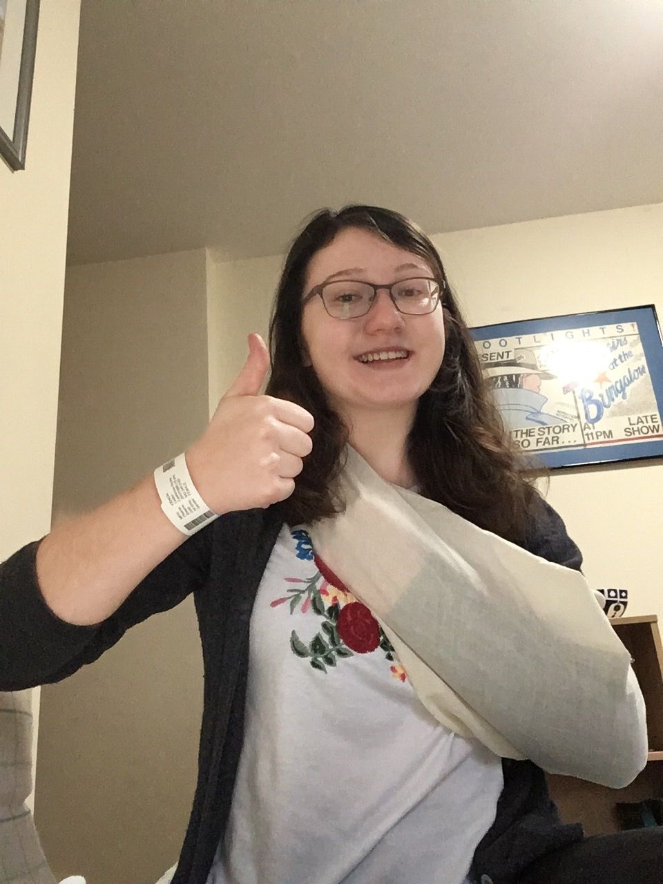 Image may contain: Clothing, Apparel, Accessory, Glasses, Accessories, Finger, Thumbs Up, Human, Person