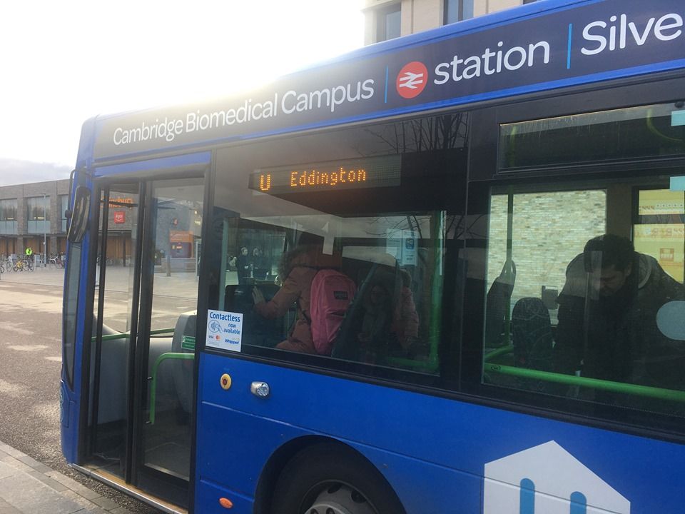 Image may contain: Bus Stop, Person, Human, Vehicle, Transportation, Bus