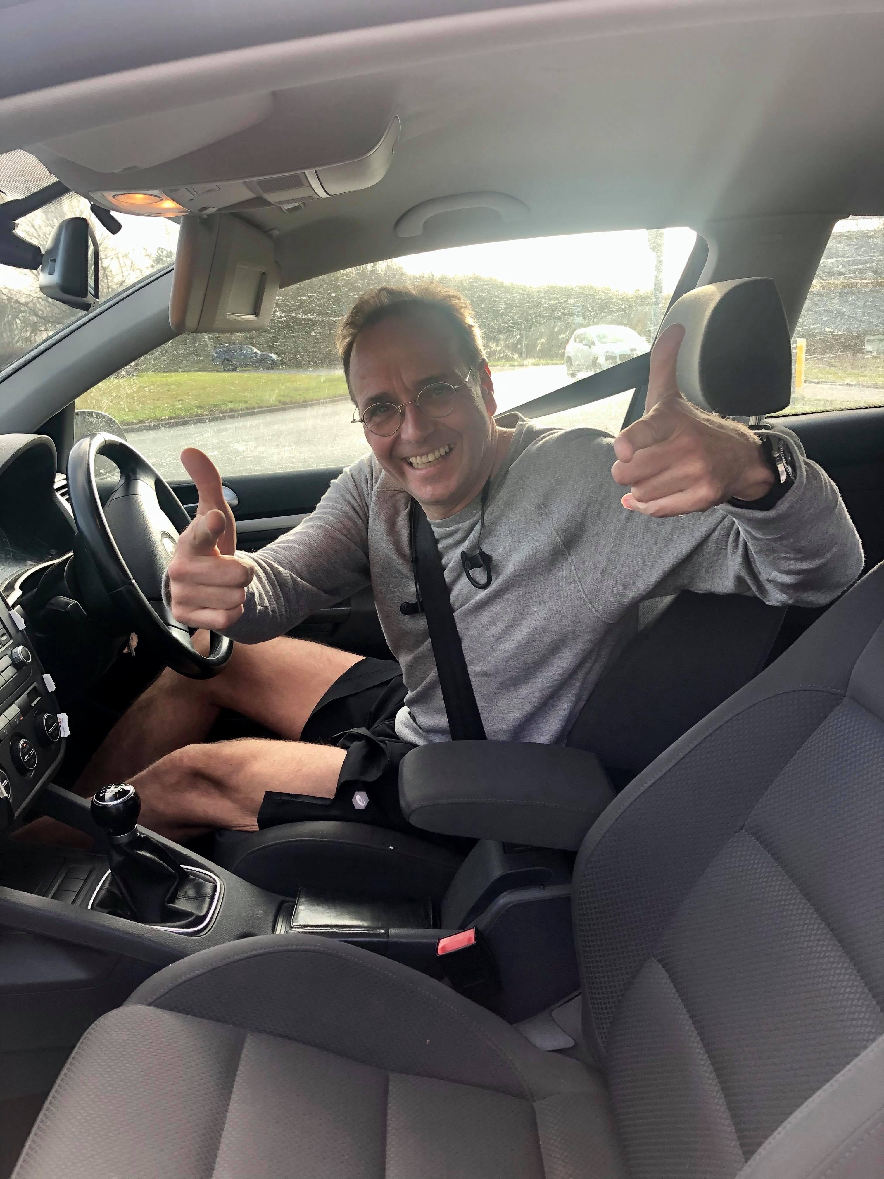 Image may contain: Car Seat, Headrest, Transportation, Driving, Vehicle, Sitting, Human, Person, Cushion