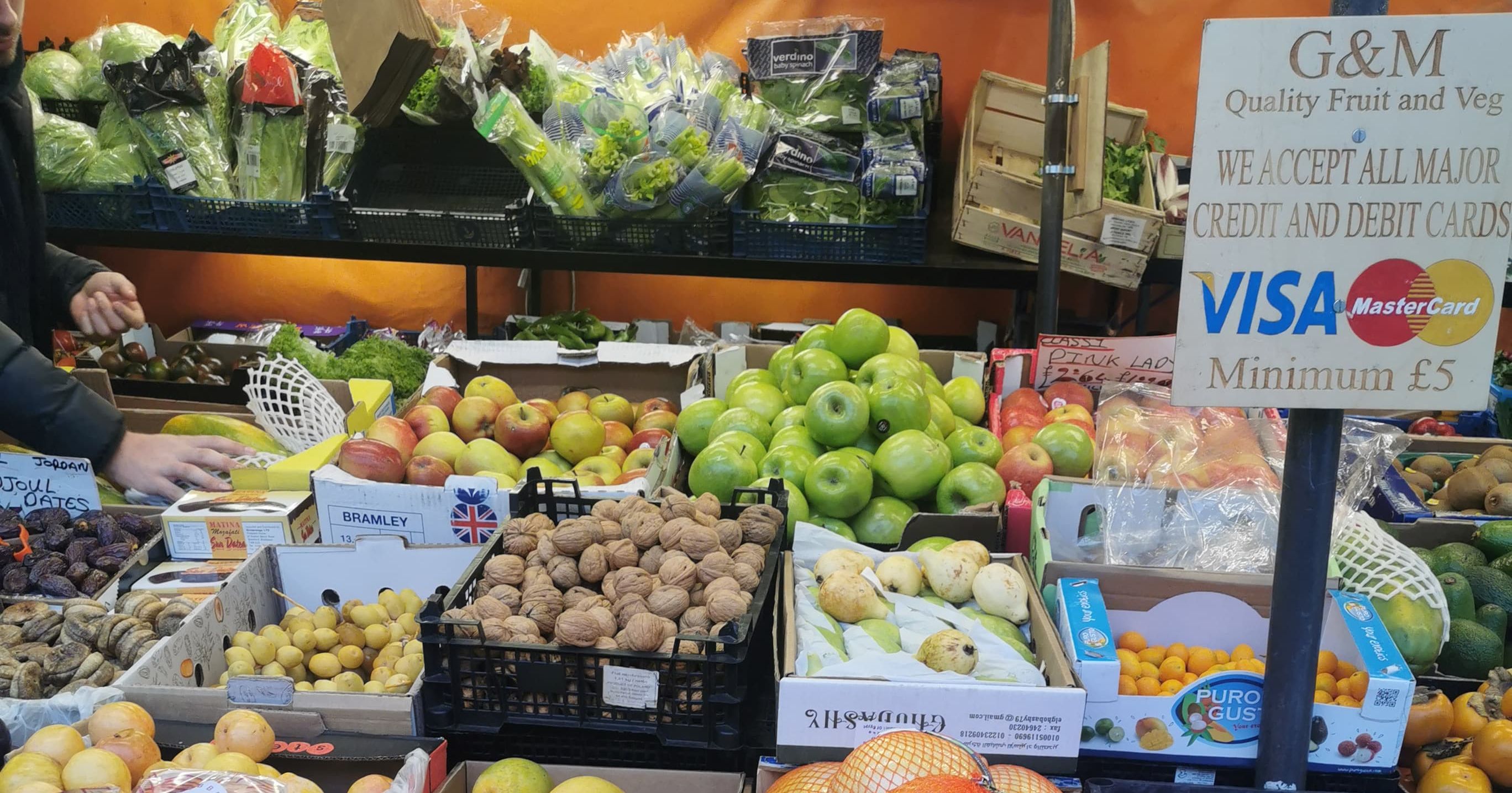 Image may contain: Grocery Store, Shop, Burger, Citrus Fruit, Food, Fruit, Person, Human, Shelf, Market, Plant