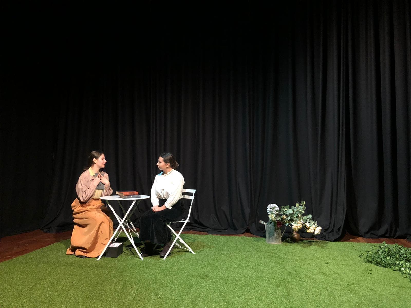 Image may contain: Lawn, Stage, Human, Person, Grass, Plant