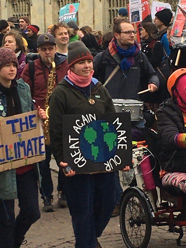 Image may contain: Vehicle, Transportation, People, Parade, Crowd, Person, Human