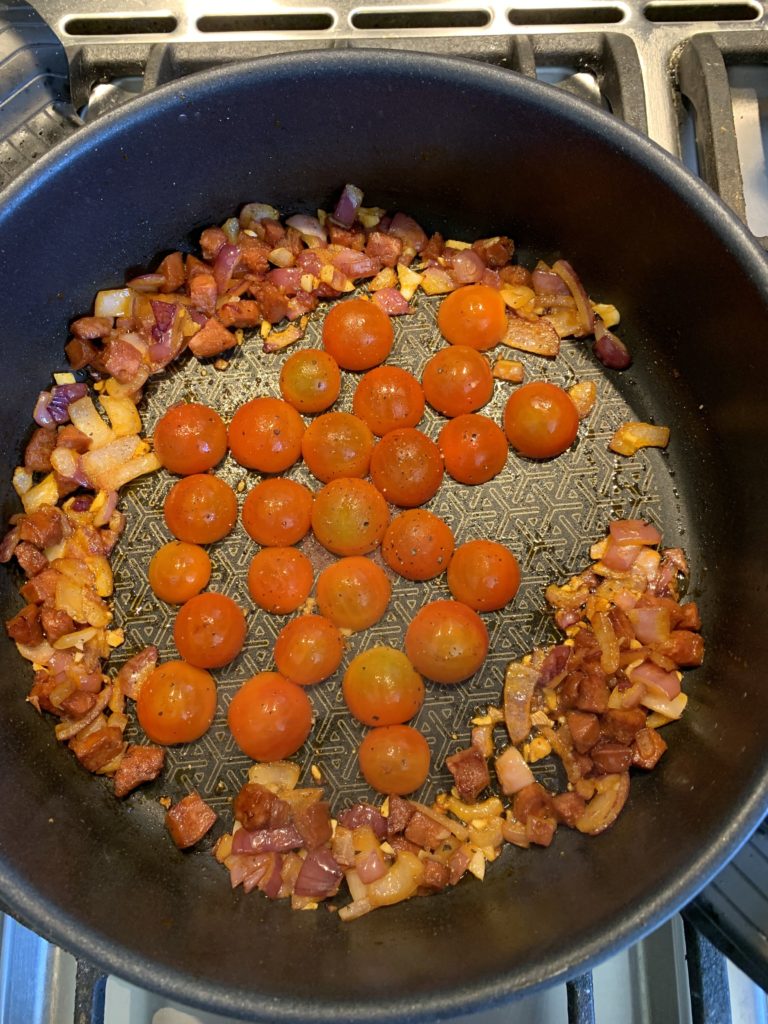 Frying pan with ingredients in