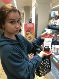 Lisa poses with the cleaning fluid
