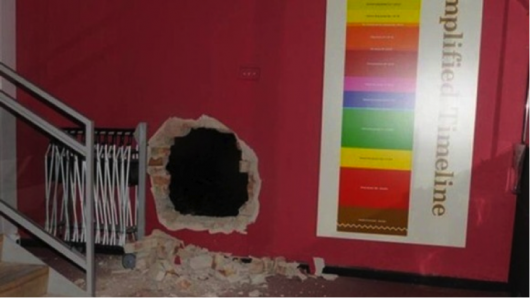 The hole the pair cut into the Oriental Museum. Photo: PA Wire.