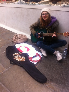Young and sweet, only 17. She even has a tambourine.