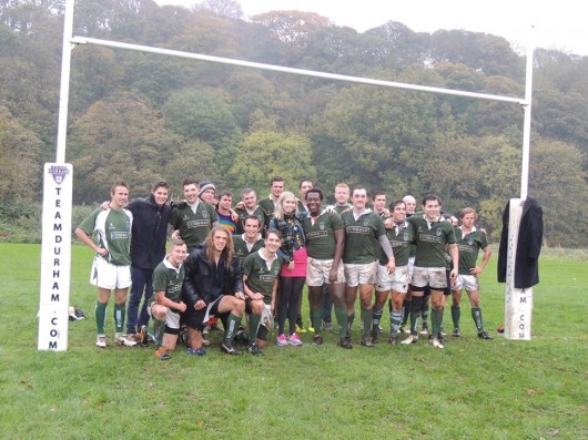 Reconciling their differences. Flo Perry with the Cuth’s Rugby team last term 
