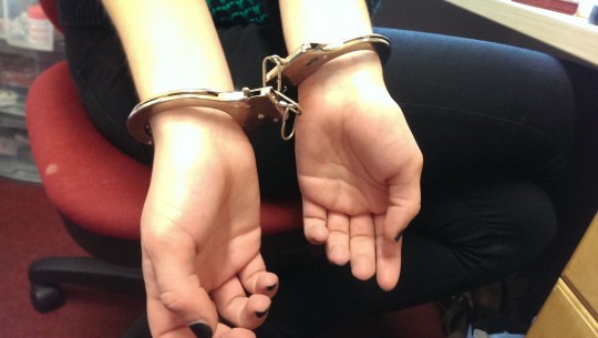 They can’t text you if their hands are cuffed up…