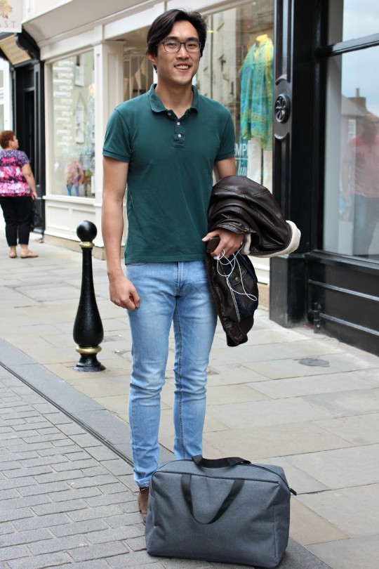 Elvin, a Law student at St. Mary’s, keeps it casual in washed out jeans and a polo.
