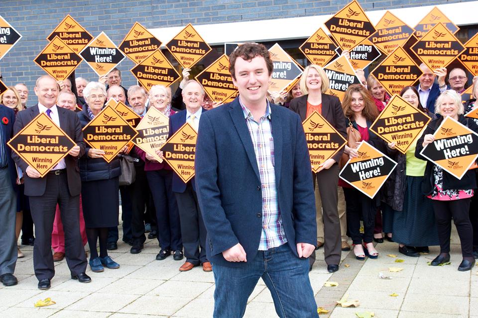Craig Martin surrounded by party faithful