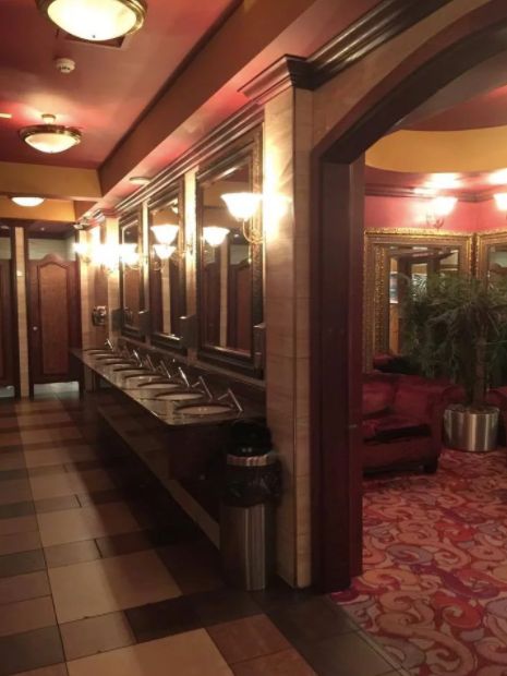 Image may contain: Corridor, Home Decor, Carpet, Furniture, Couch, Potted Plant, Plant
