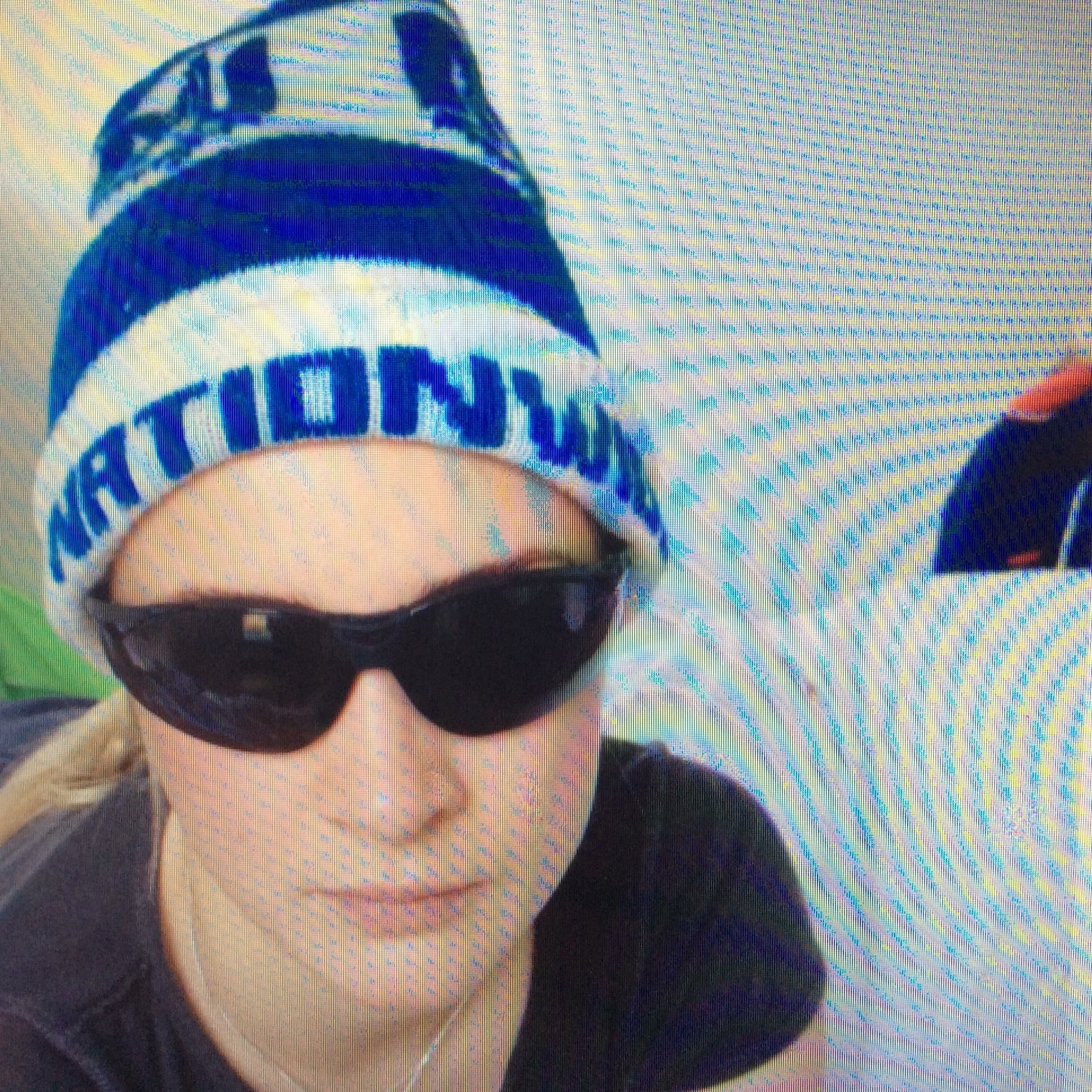 Image may contain: Goggles, Glasses, Hat, Cap, Beanie