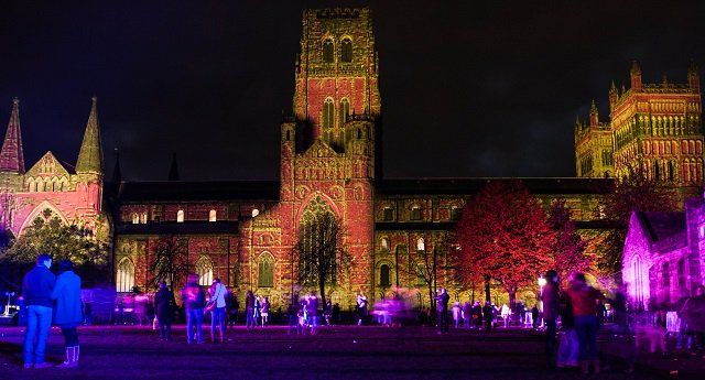 Image may contain: Night Life, Night Club, Worship, Church, Festival, Carnival, Fort, Castle, Architecture, Human, Person, People